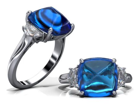 Adriatic Sea Sugarloaf Cabachon Blue Sapphire and 2 Cadillac Diamond Side Stones For Sale